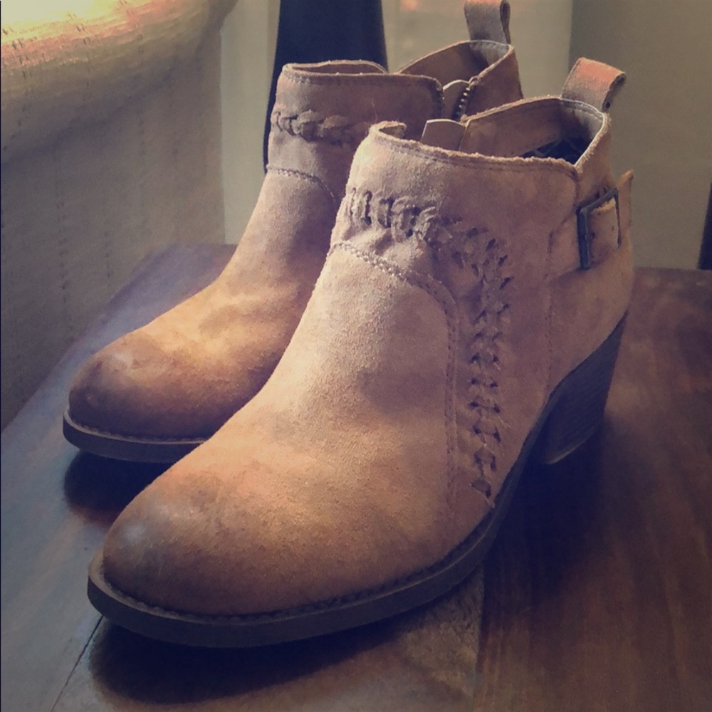 Ankle boots with buckle and braid detail